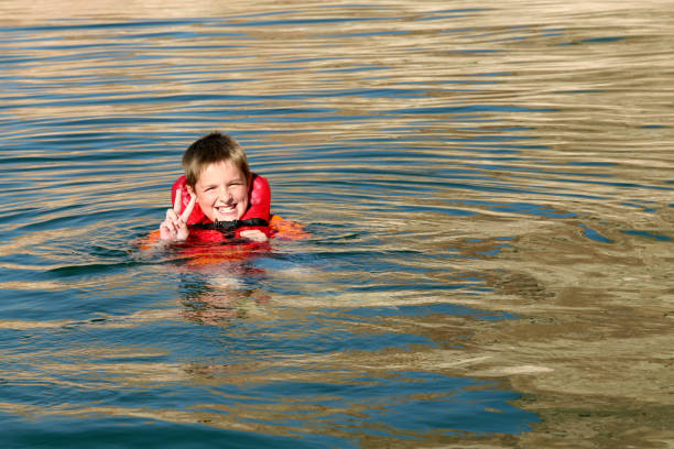 istock Boy swimming in Lake 172203398