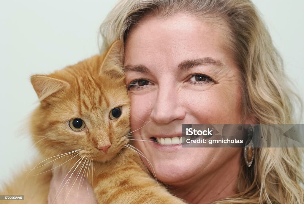 Beautiful woman and her friend Spirit Woman with her friend Domestic Cat Stock Photo