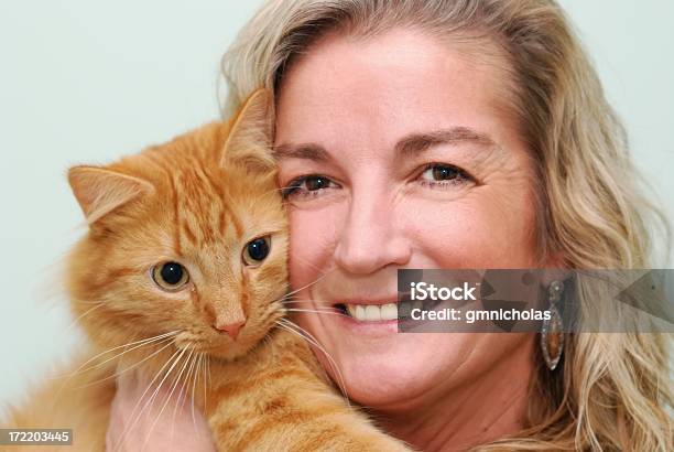 Beautiful Woman And Her Friend Spirit Stock Photo - Download Image Now - Domestic Cat, Mature Women, Portrait