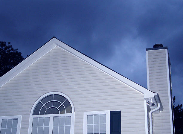 House against a dark blue sky