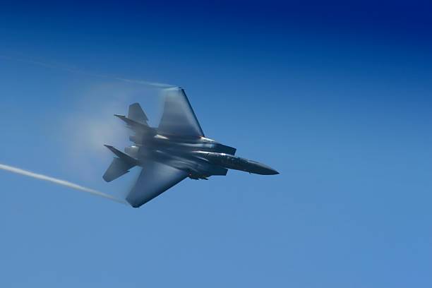 istock F-15 fighter jet with contrails 172203597