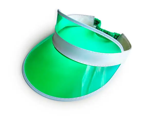"Isolated green visor, typical of casino dealers, accountants and other technical types."