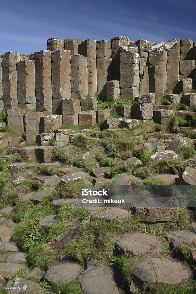 Giants Causeway basalt lava columns in Northern Ireland "Giants Causeway, Northern Ireland. Basalt lava columnar jointing on the beach" Causeway Stock Photo