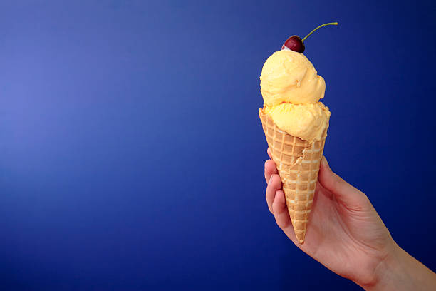 French Vanilla Ice Cream with Cherry on Blue