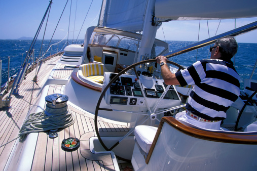 man sailing luxury sailboat yacht phuket waters