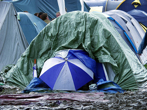 Roskilde Festival (Rain in Pain) Roskilde Festival 2004 music festival camping summer vacations stock pictures, royalty-free photos & images