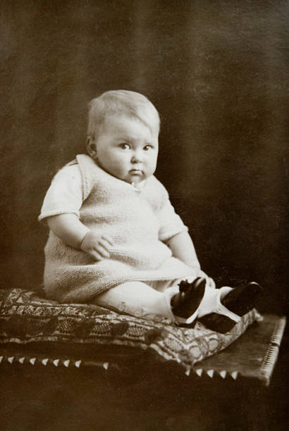 Vintage Photo With Baby Girl In Chair stock photo