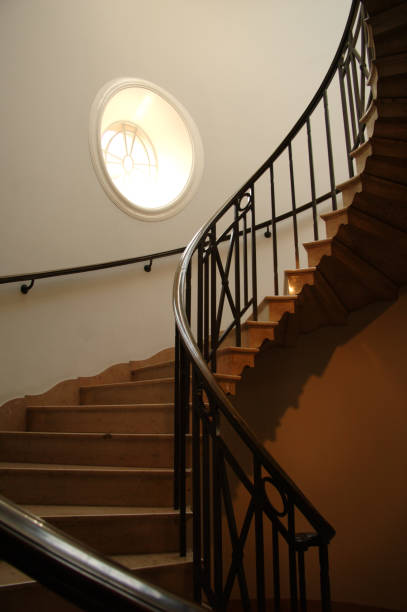 istock circle of light-spiral staircase 172206408