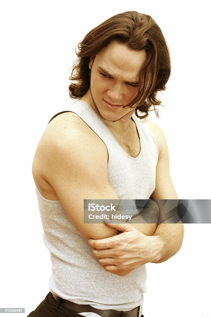 Worry Young man with arms folded looking worried Men Stock Photo
