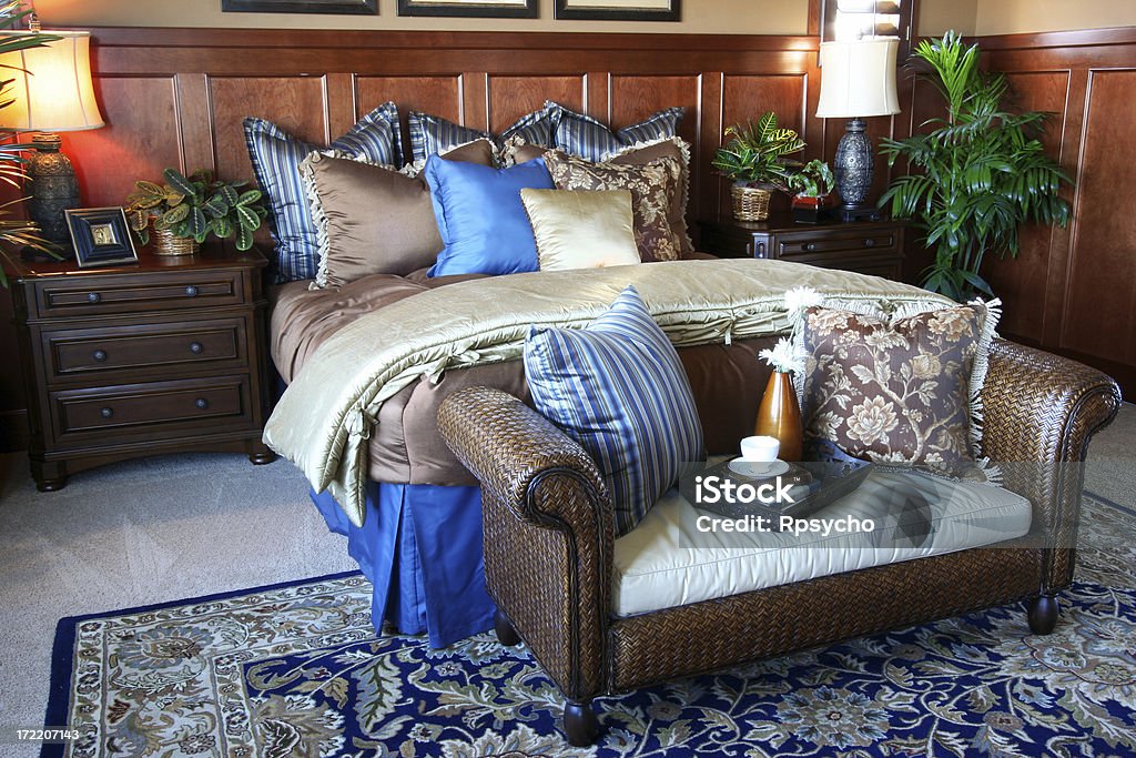 Bedroom Fantasy "A beautiful model bedroom in shades of chocolate, blue and chestnut.View other" Duvet Stock Photo