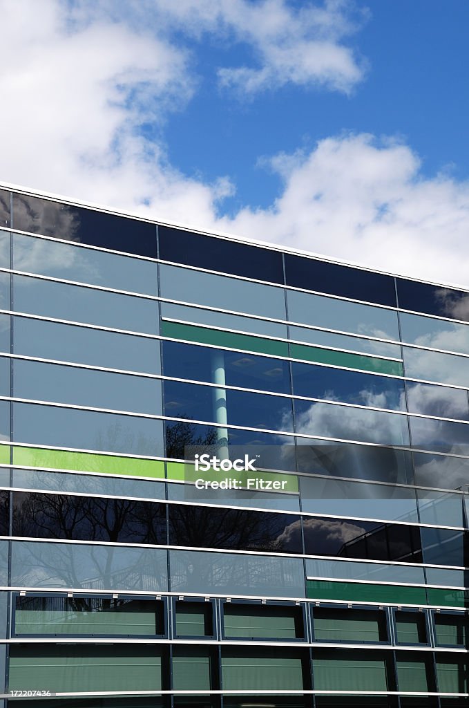 lovely green bright and modern facade of an huge office building, certainly unique, hamburg. Architecture Stock Photo