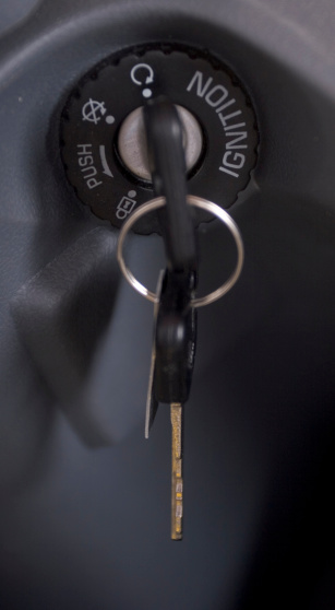 keys hanging from a motor-scooter ignition