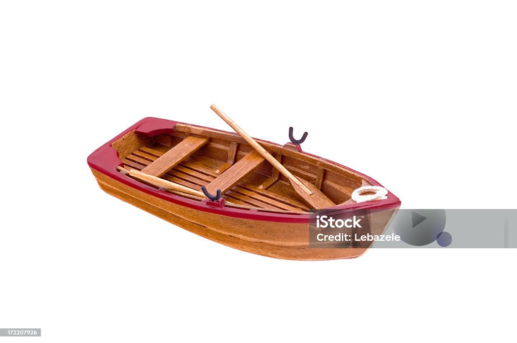wooden classical boat model 5cm wooden boat model with a rope on the deck.  Cut Out Stock Photo