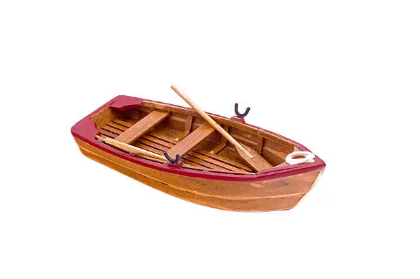 5cm wooden boat model with a rope on the deck. 