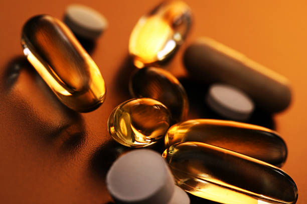 vitaminas - gel effect capsule pill vitamin e - fotografias e filmes do acervo