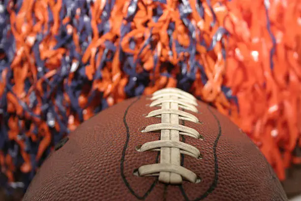 American Football with a pom pom background