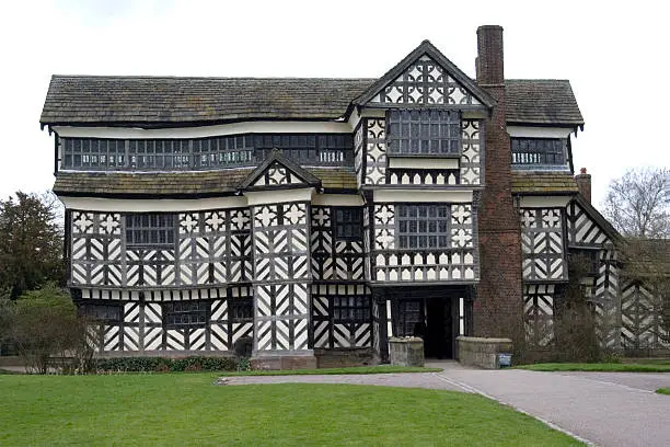 "A Tudor timber-framed moated manor house, one of the finest in Britain, dating to around 1450 with later additions.More views of the Hall are available here:"