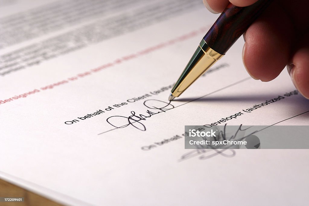 Firmar el contrato - Foto de stock de Acuerdo libre de derechos