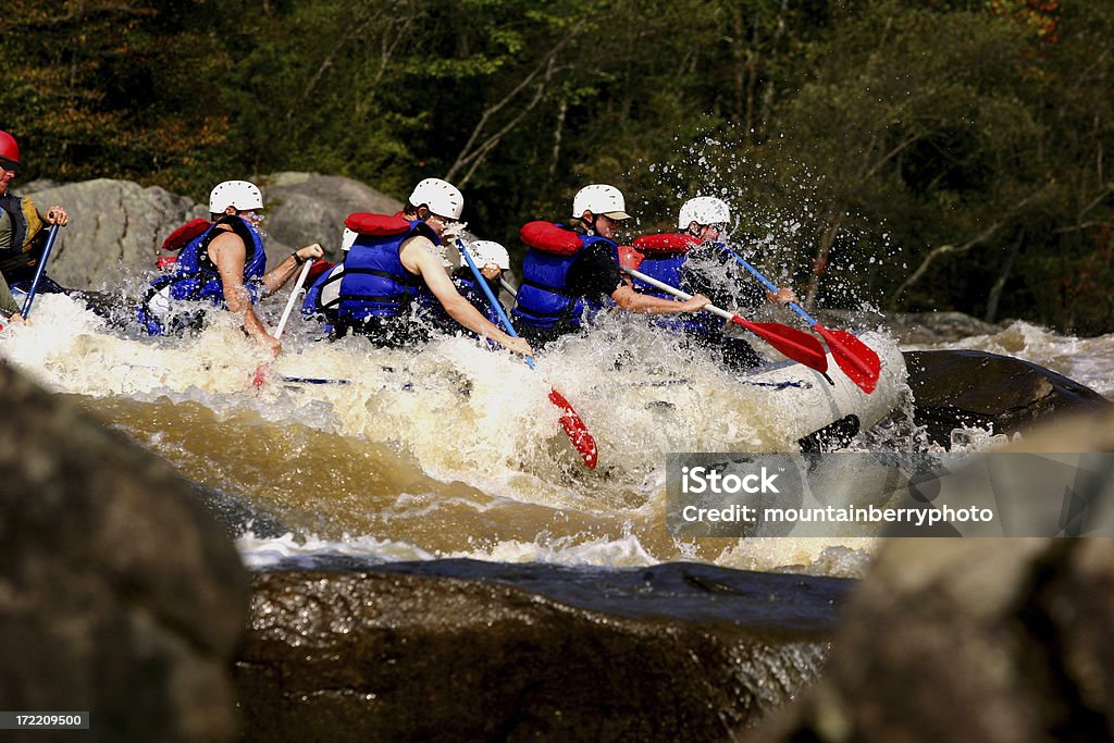 Rock Raft "Raft seems to be riding on the rocks, or between the rocks." Adventure Stock Photo