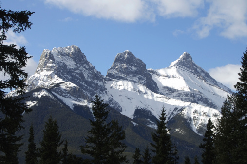 Rocky Mountain landmark in Canmore Alberta. View from neighbourhood balcony on a spring morning.