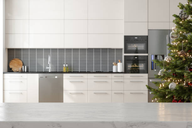 istock Empty White Marble Countertop And Christmas Tree With Blurred Kitchen Background 1722097632