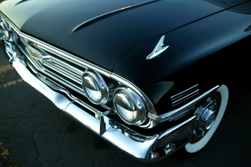 Detail closeup on a retro black car from america