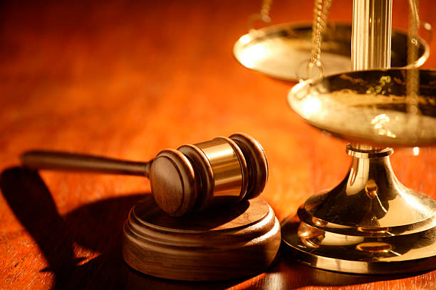 Close up of Justice Scale and Gavel.  Shot with shallow depth of field.