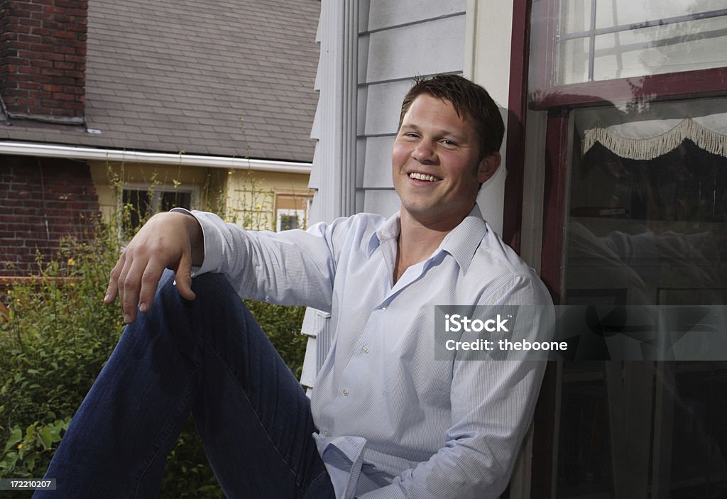 relaxed home owner a relaxed home owner 20-24 Years Stock Photo