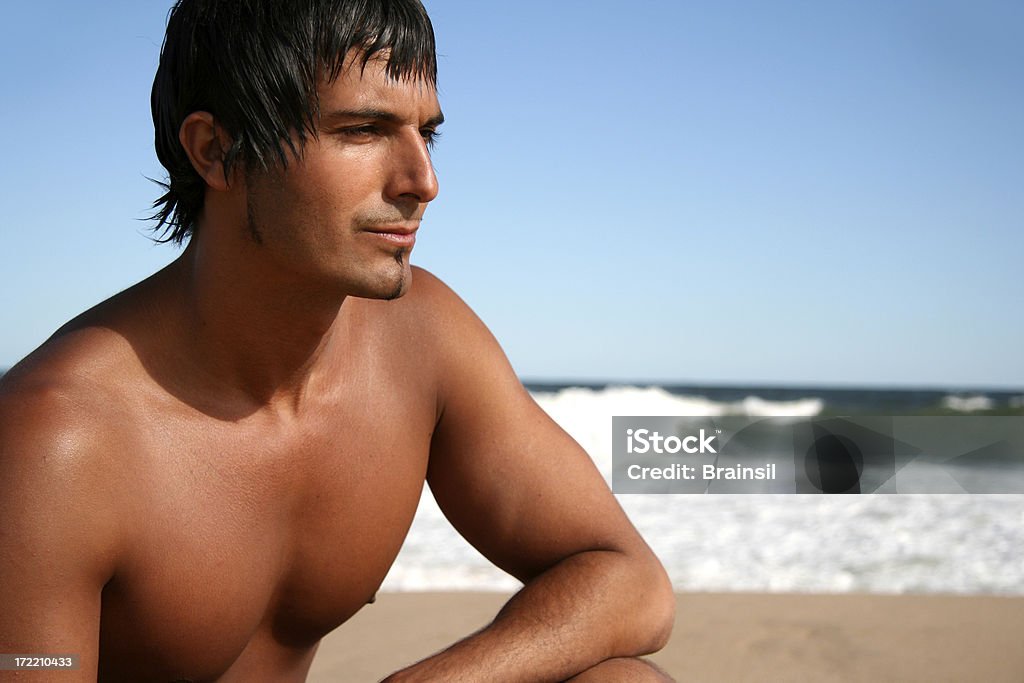 Uomo sulla spiaggia - Foto stock royalty-free di Abbronzatura