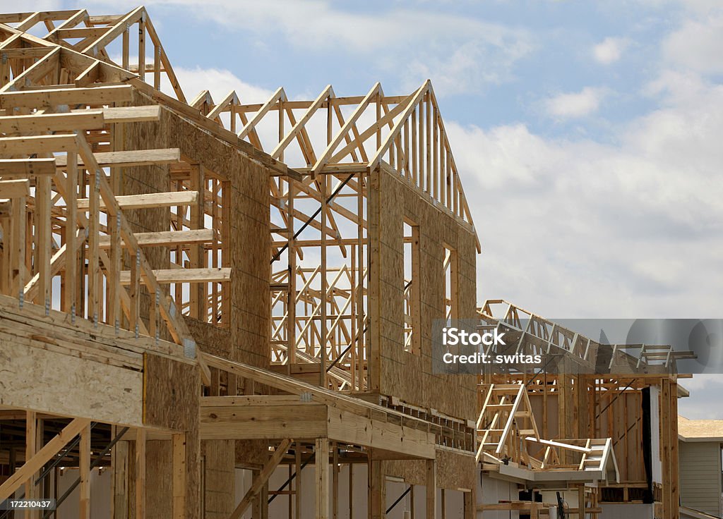 Novas casas de construção site - Foto de stock de Armação de Construção royalty-free