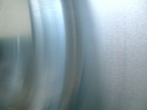 Abstract and beautiful.  No motion blur, that's pure stainless steel from my kitchen.