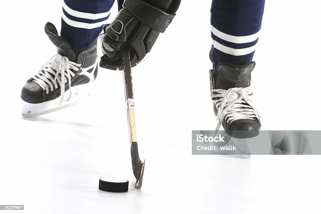 Gros plan des jambes de Joueur de hockey sur glace - Photo de Froid libre de droits