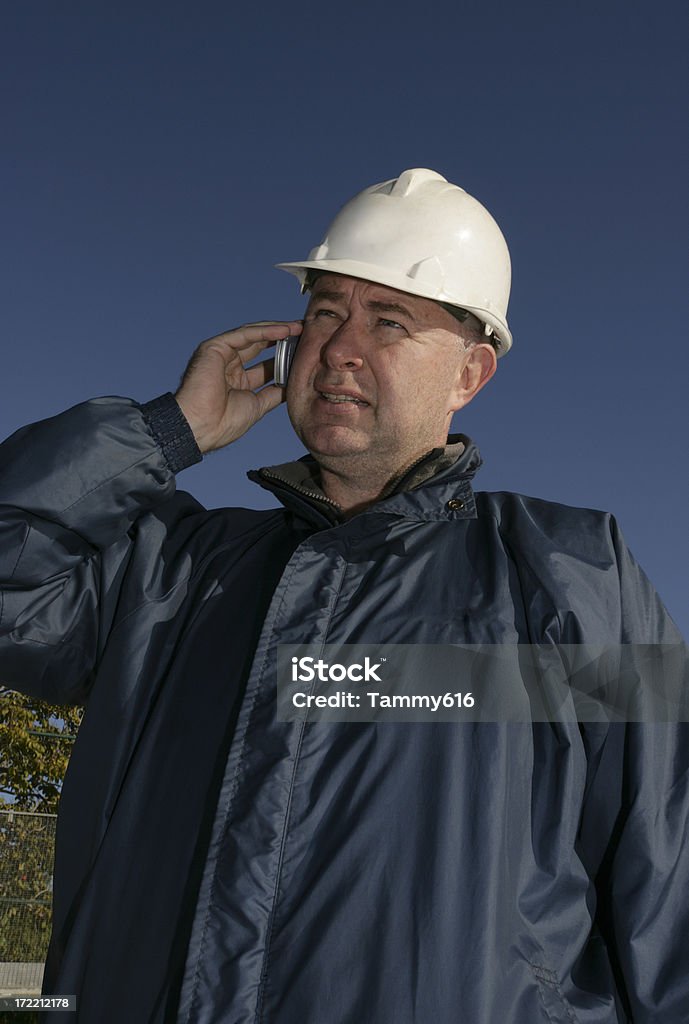Строительство босс на телефон - Стоковые фото Профессия роялти-фри