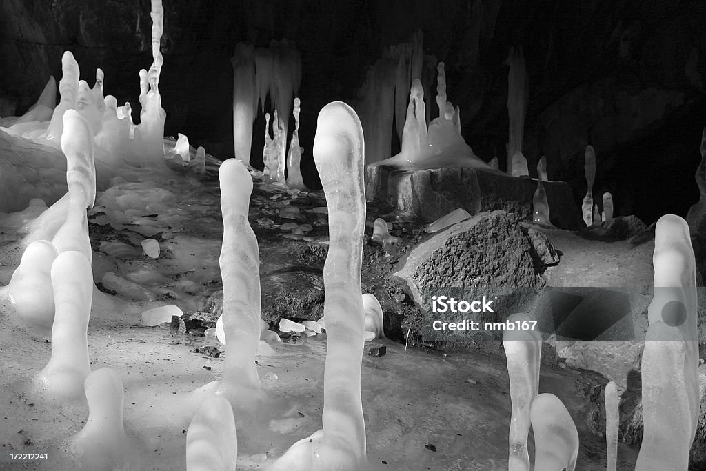 Ice Fields Ice standing upright on the floor of a water cave in central Pennsylvania. Stalagmite Stock Photo