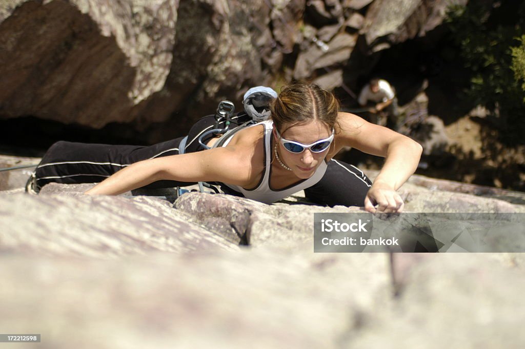 climber woman climbing woman in full sun, high quality and resolution Adult Stock Photo