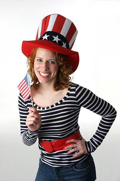 istock Patriotic woman waves flag 172213256