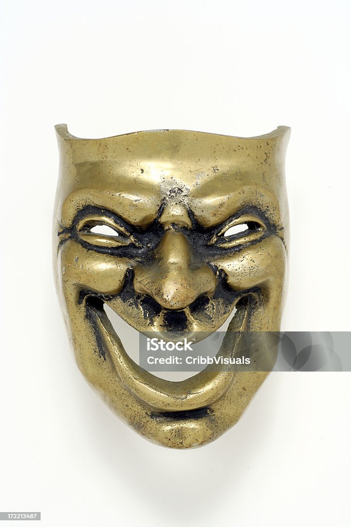 Comedy brass mask on white background  Acting - Performance Stock Photo