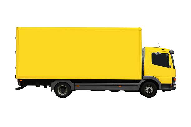 Large, yellow moving truck isolated stock photo