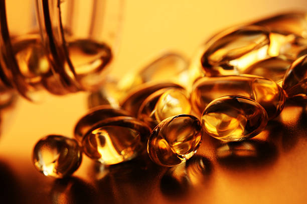 vitaminas, gel comprimido - gel effect capsule pill vitamin e - fotografias e filmes do acervo