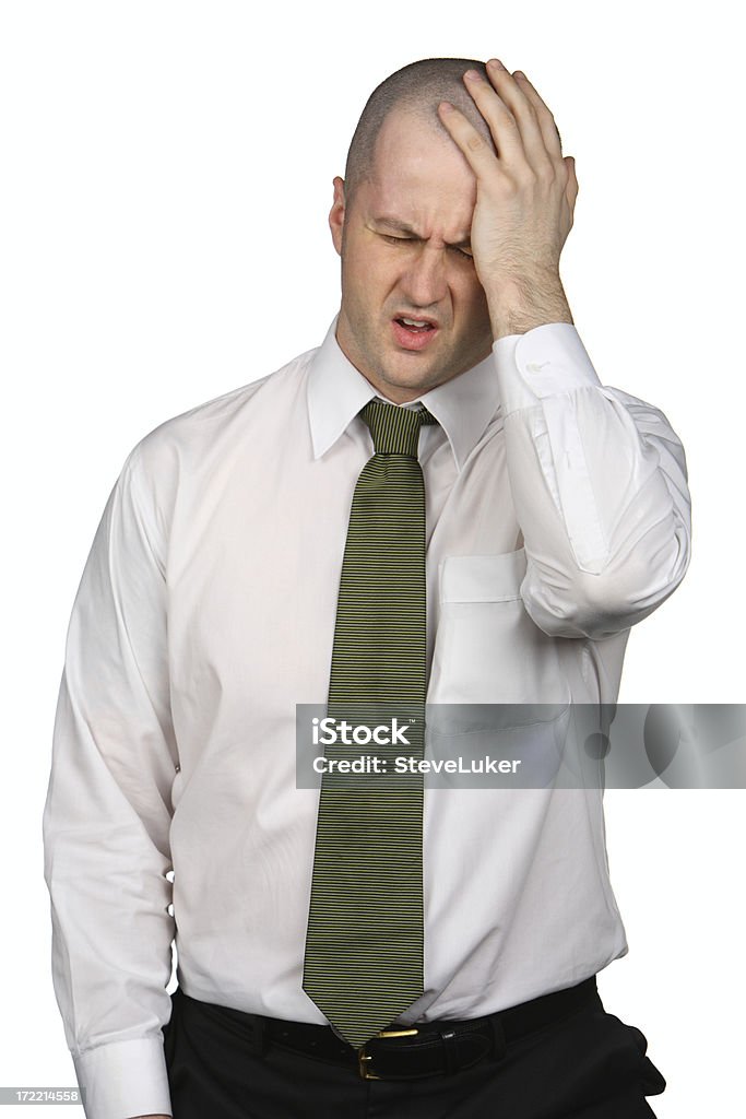 Stressed Businessman Businessman on white looking tired and stressed. Adult Stock Photo