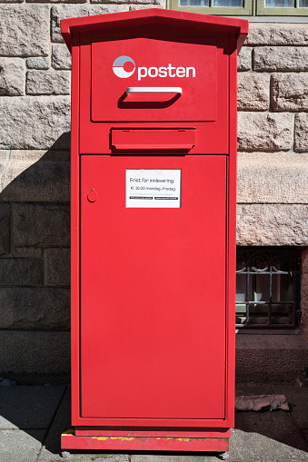 Aalborg, Denmark. Friday 8 April 2022. Post Letterbox on the high street in Aalborg, Denmark