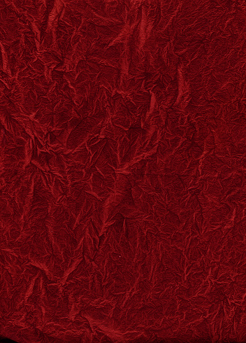 Dark red fabric cloth texture background, seamless pattern of natural textile.