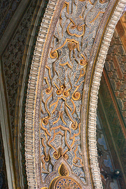 Gold, marble and enamel arches in the stunning Alcazar Palace in Seville, Southern Spain.