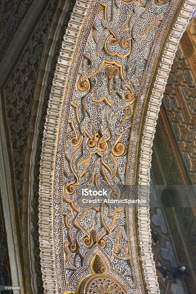 Intricate Arches, Alcazar - Seville Gold, marble and enamel arches in the stunning Alcazar Palace in Seville, Southern Spain. Alcazar Palace Stock Photo