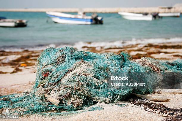 Abondoned Fishing Nets Stock Photo - Download Image Now - Fishing Industry, Netting, Garbage