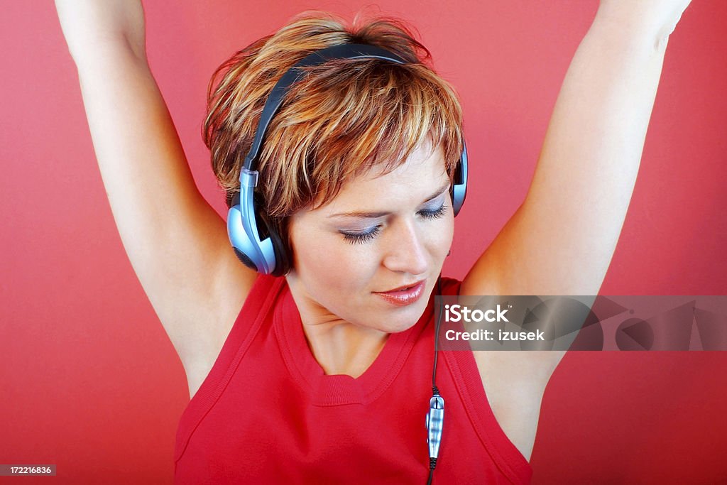 Frau Musik hören - Lizenzfrei Arme hoch Stock-Foto