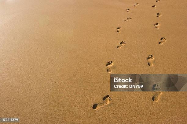 Footprints Stock Photo - Download Image Now - Footprint, Sand, Hope - Concept