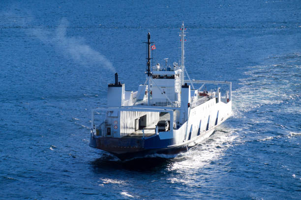 istock car ferry in Norwegian fjord 1722175298