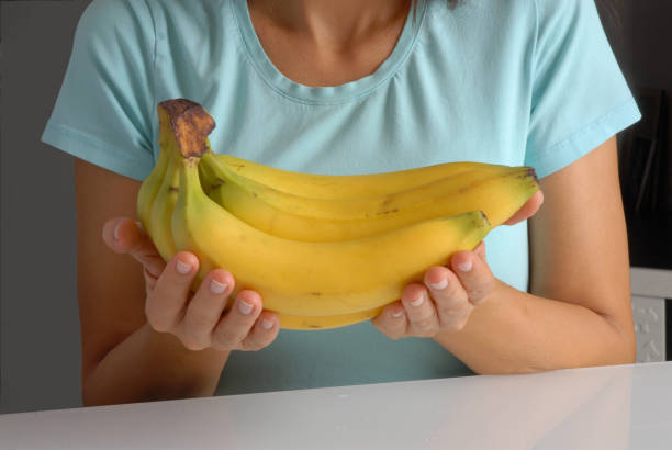 istock Woman banana hands 1722179768