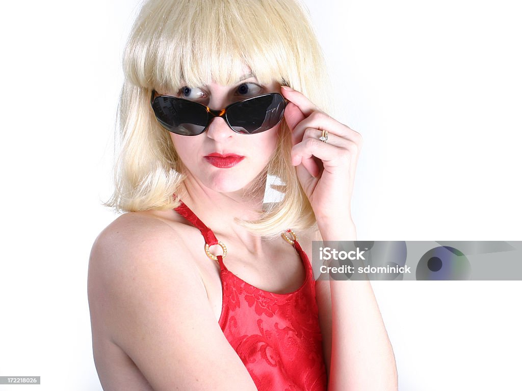 Paranoid An uncomfortable woman trying to hide behind very large sunglasses... Actor Stock Photo